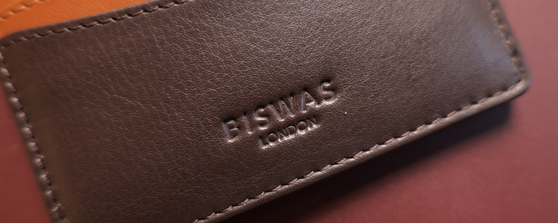 The BISWAS wordmark debossed into full-grain Nappa leather