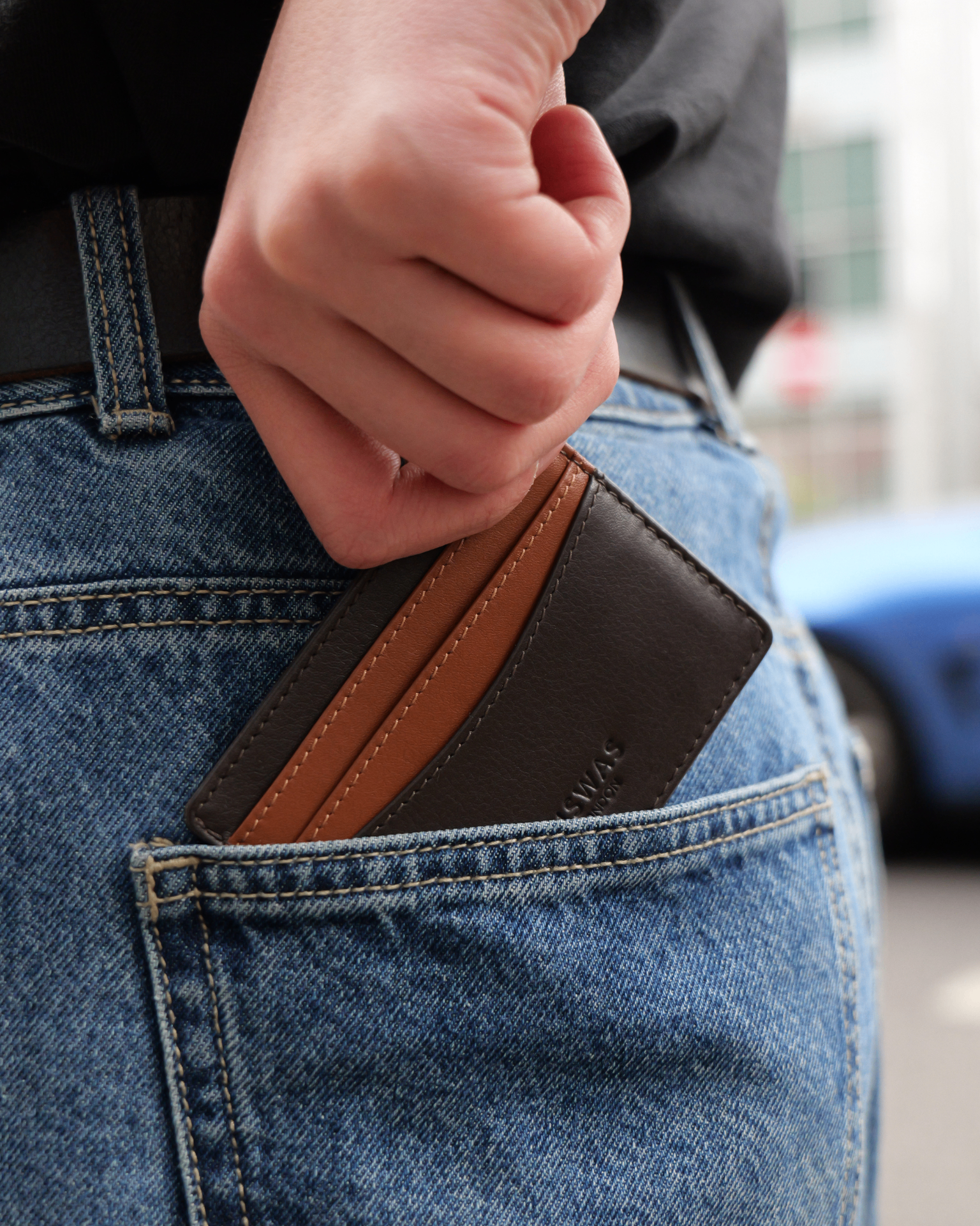 BISWAS LONDON Nappa leather card holder, close-up of debossed surname