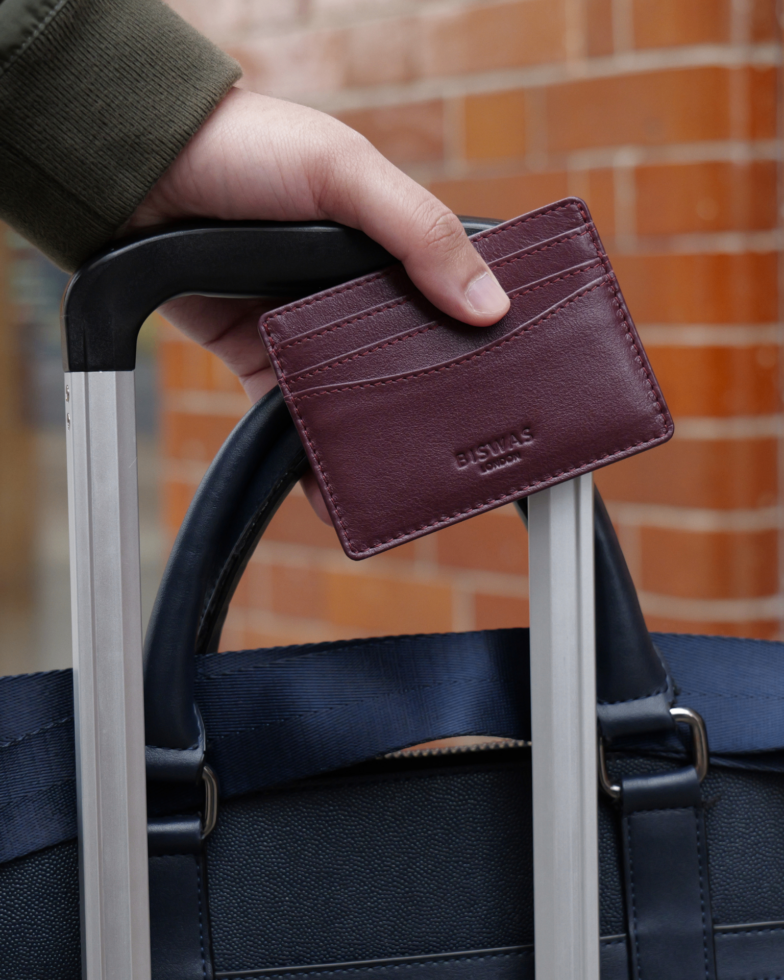The Attaché card holder open, showing ID window and card slots
