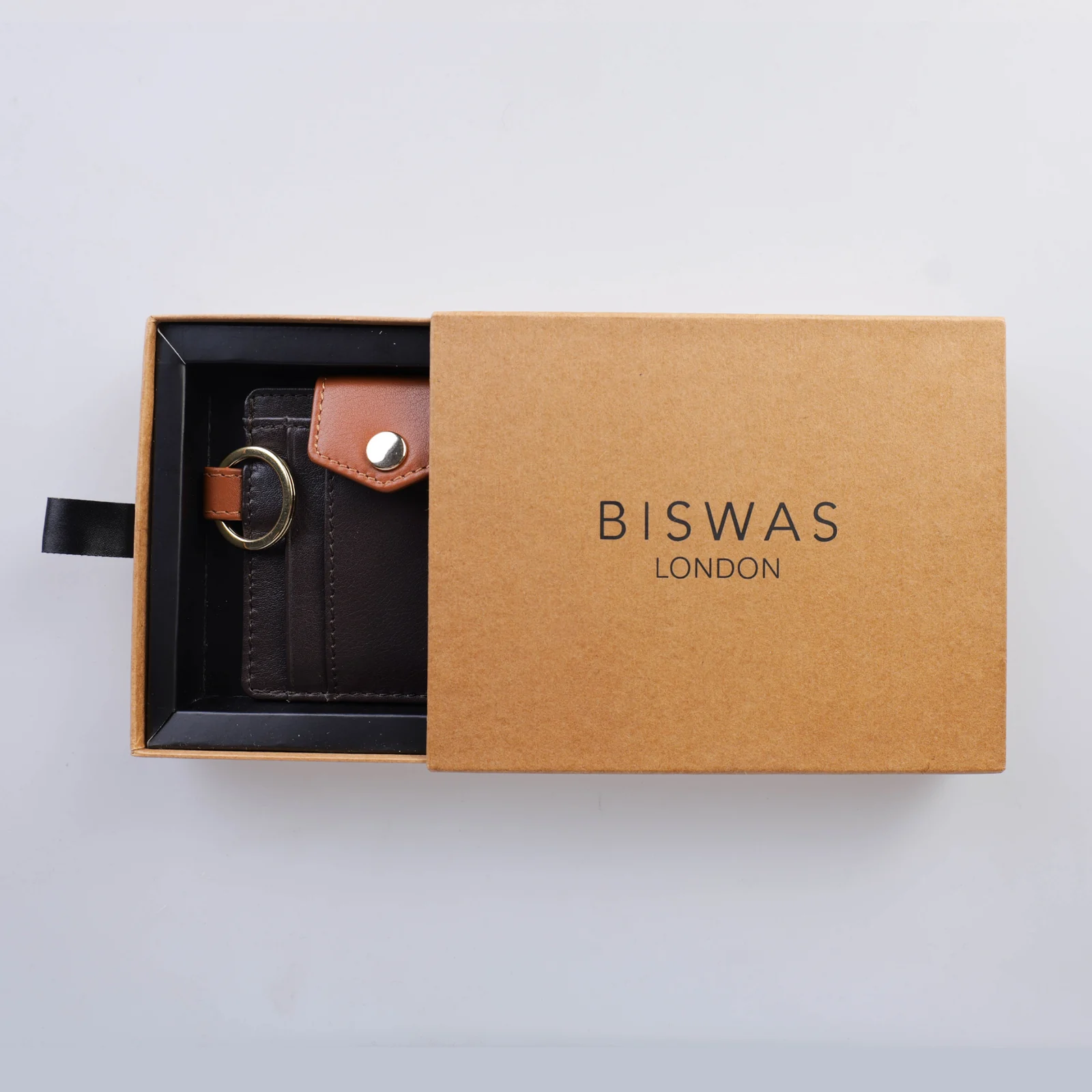 The Attaché Espresso cardholder in its rigid drawer gift box