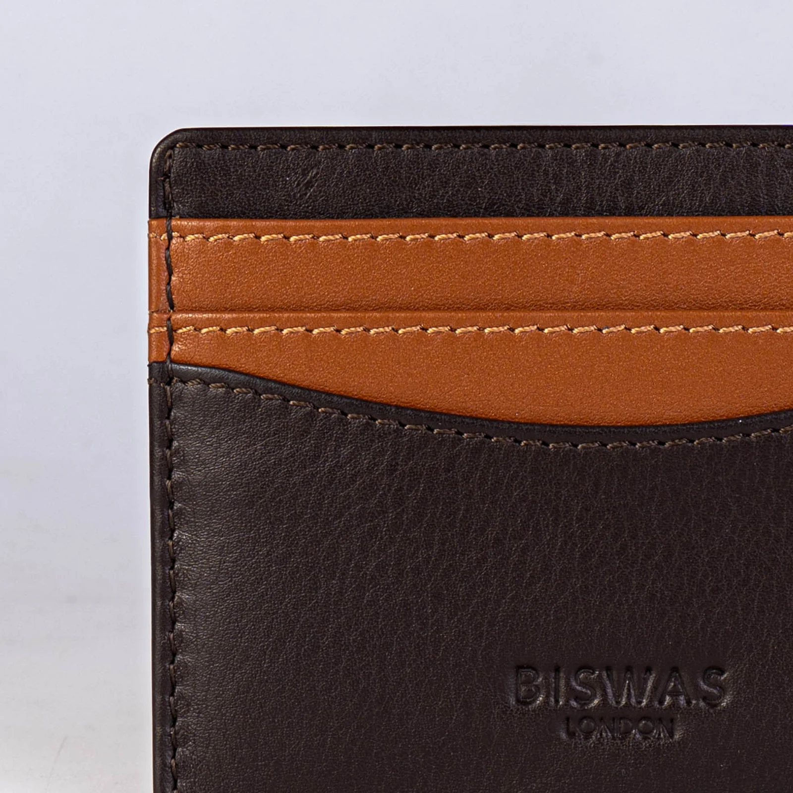 Close-up of Espresso Nappa leather card slots and tonal stitching